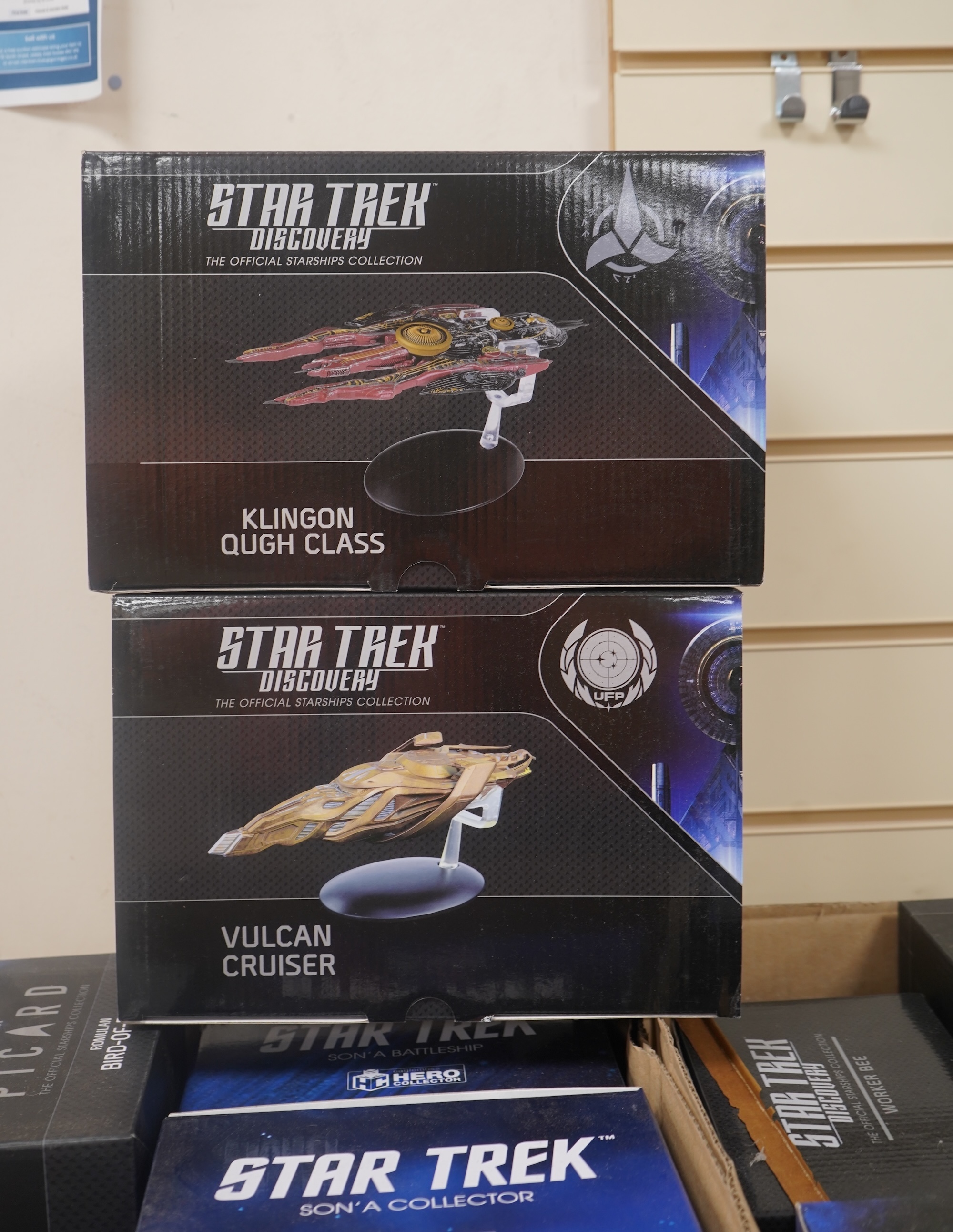 Eighteen boxed Eaglemoss Star Trek magazine issue models, including; a Vulcan Cruiser, a Klingon Qugh Class vessel, a Son’a Battleship, a Romulan Flagship, Jupiter Station, Ty’Gokor Orbital Station, etc. Condition - good